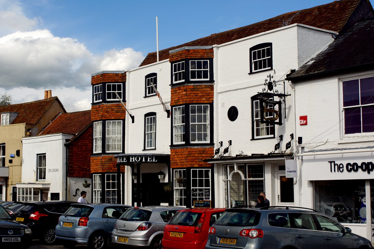 The Bugle Hotel's white brick façade on The Square, Titchfield
